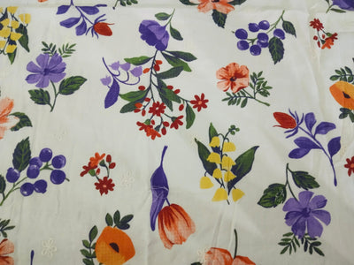 100% Cotton printed and  embroidered fabric  58 inches wide 147 cms. available in 2 colors purple orange floral and red blue floral