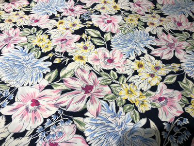 100% Cotton Poplin 58" black with pink, yellow ,blue and green floral [17581]