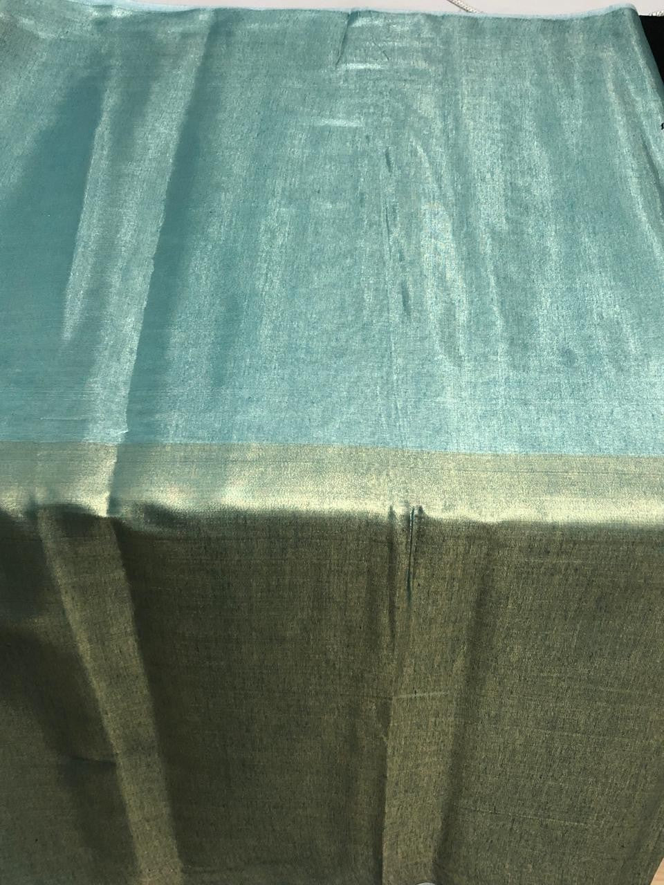 Cotton Tissue  sheer 44" wide 22" of each color half and half available in 2 colors blue/teal and gold/gold[ [18354/55]