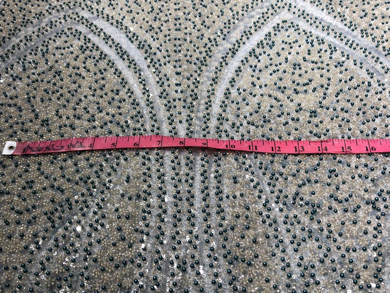 NET fabric with sequins and  pearls available in 2 colors black and white 56" wide [17807/08]