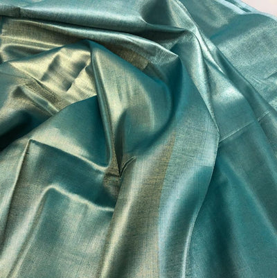 Cotton Tissue  sheer 44" wide 22" of each color half and half available in 2 colors blue/teal and gold/gold[ [18354/55]