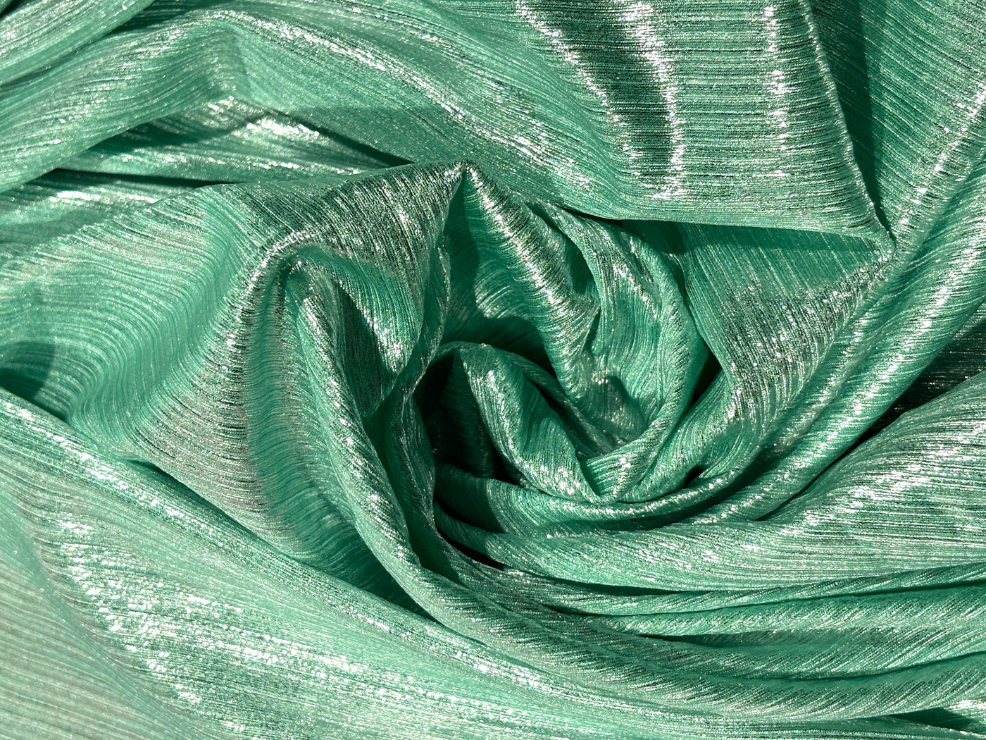 Metallic Lycra lurex fabric with subtle shimmer 58" Wide available in 7 colors black, bronze, magenta, mint ,candy pink, lilac and silver [17635/36/37/38/39/40/41]