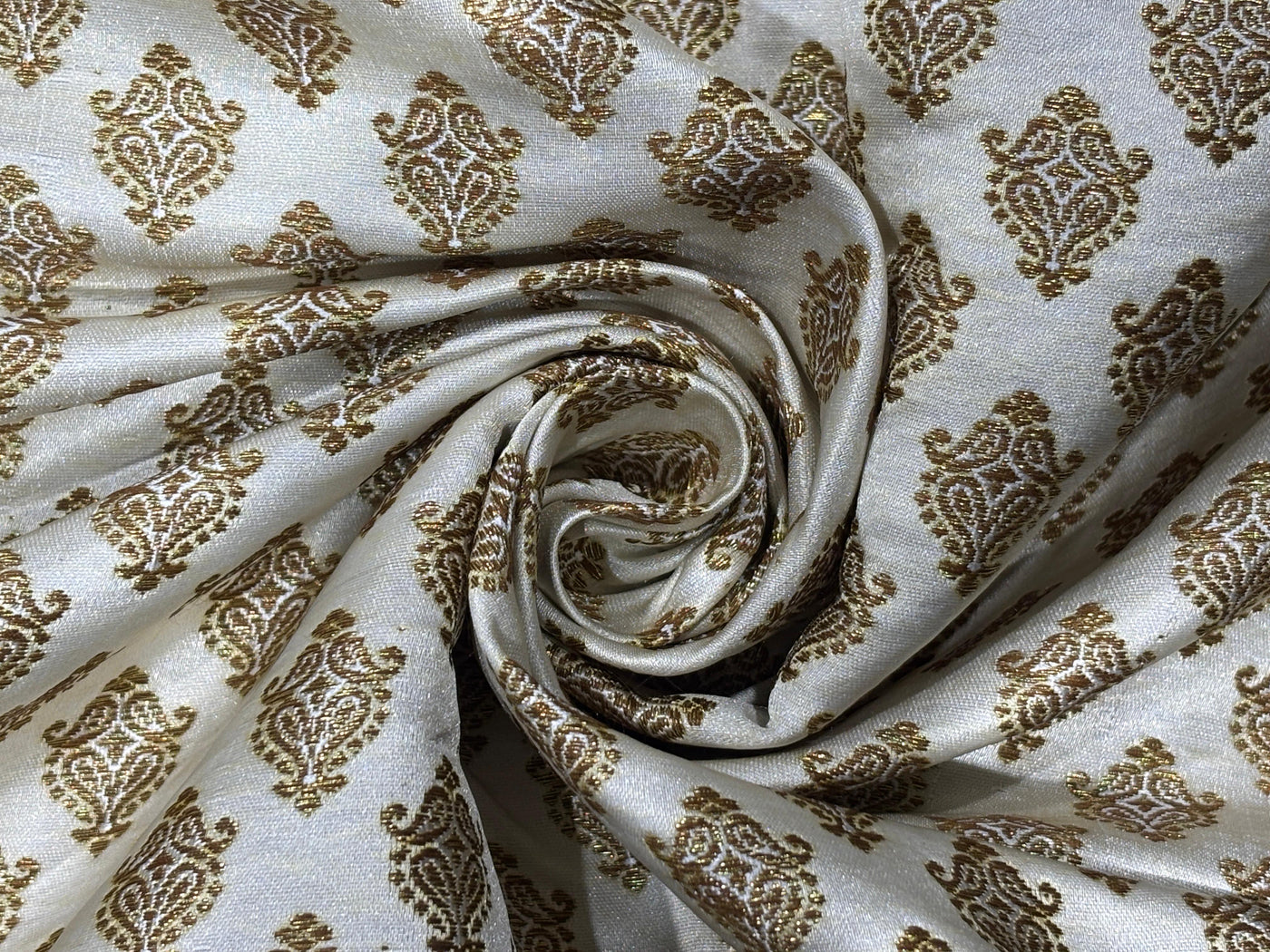 Silk Brocade fabric 44" dark ivory with antique gold jacquard motifs available in 2 designs leaf and paisley BRO1053