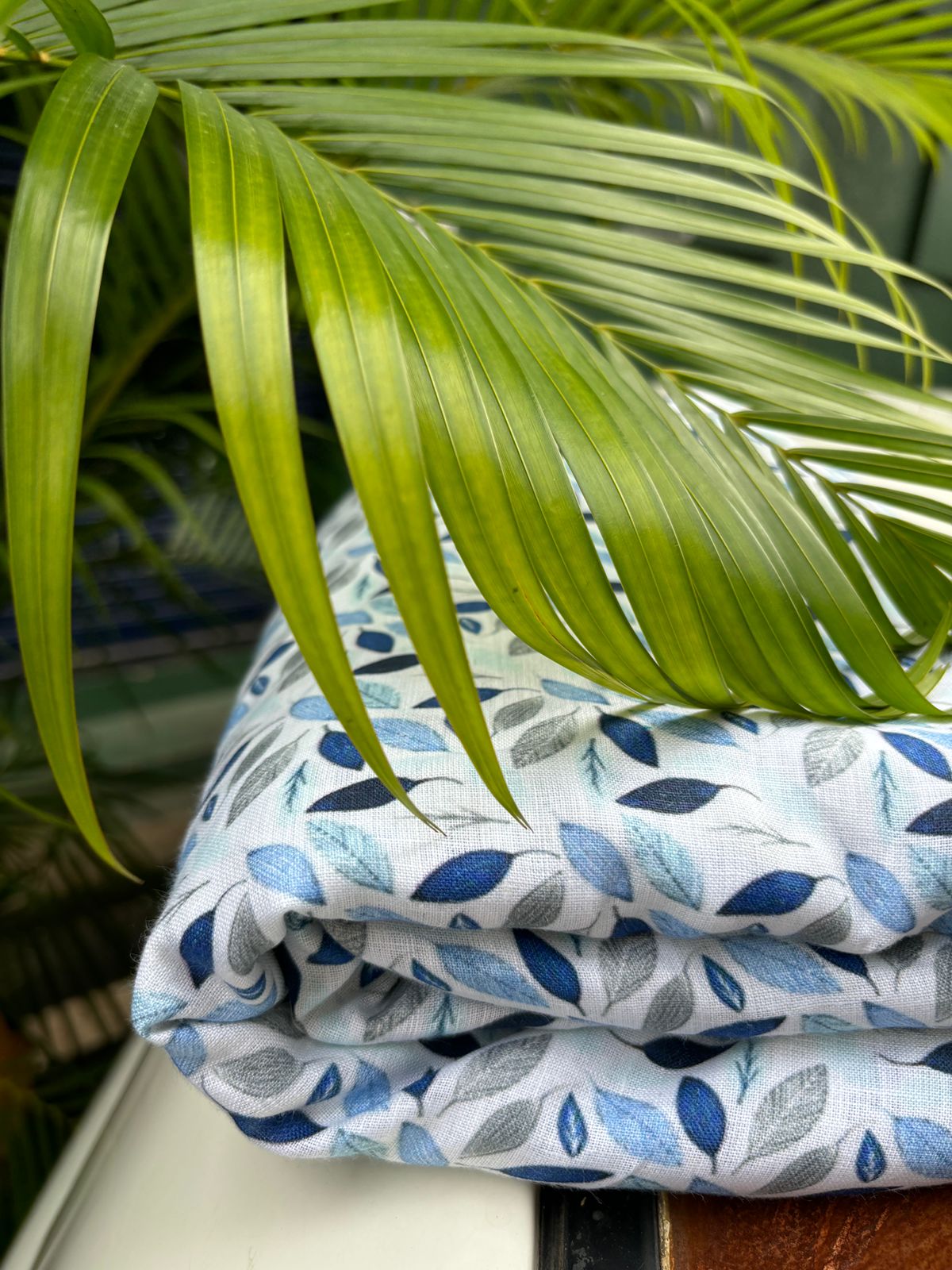 100% linen  digital print fabric 58" wide white with shades of blue leaves [16112]