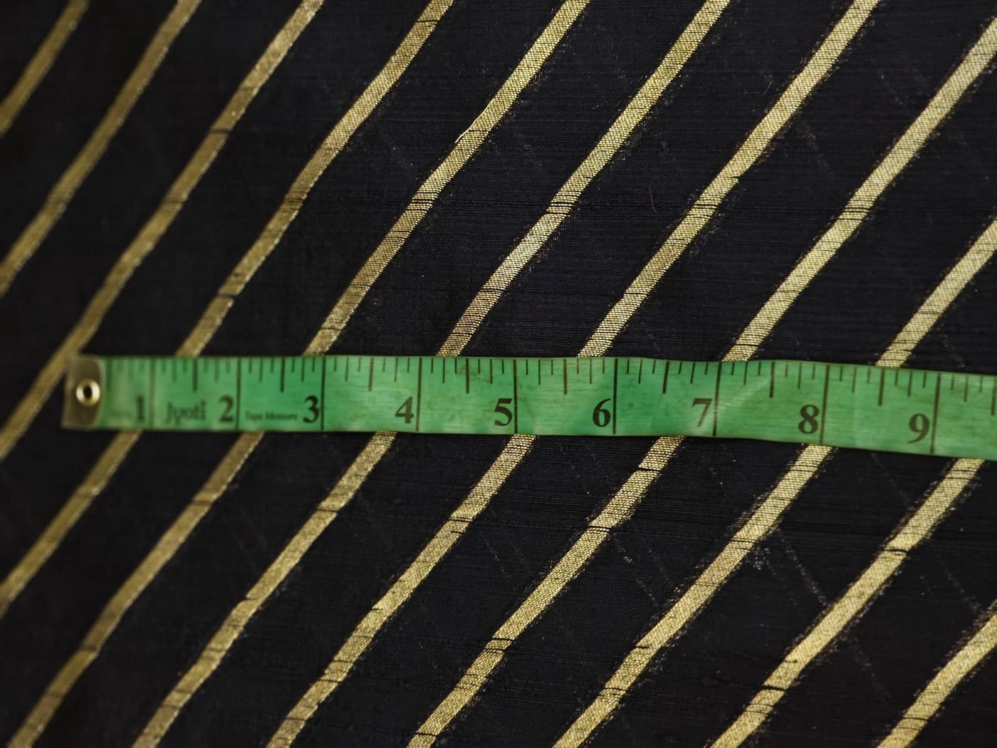 100% Silk Brocade in raw silk fabric available in 2 colors black and peacock blue with gold metallic stripe 44" wide BRO1070[3/4]