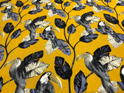 100% Cotton Poplin 58" wide digital print mustard with slate blue and grey leaves with parrots  [17613]