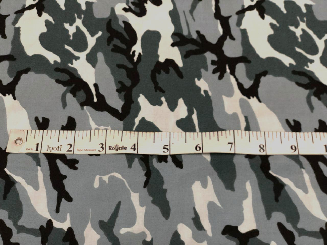 100% Cotton available in 2 prints and colors in the army  print 58" wide greens/ black and green/browns [18692/93]