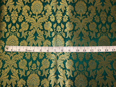Silk Brocade fabric with beautiful gold  jacquard available in 3 colors teal ,red and mulberry BRO1075