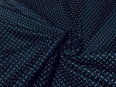 100% Cotton Poplin 48" wide dark navy with white zig zag print   [17292]