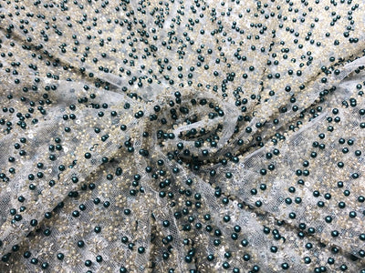 NET fabric with sequins and  pearls available in 2 colors black and white 56" wide [17807/08]