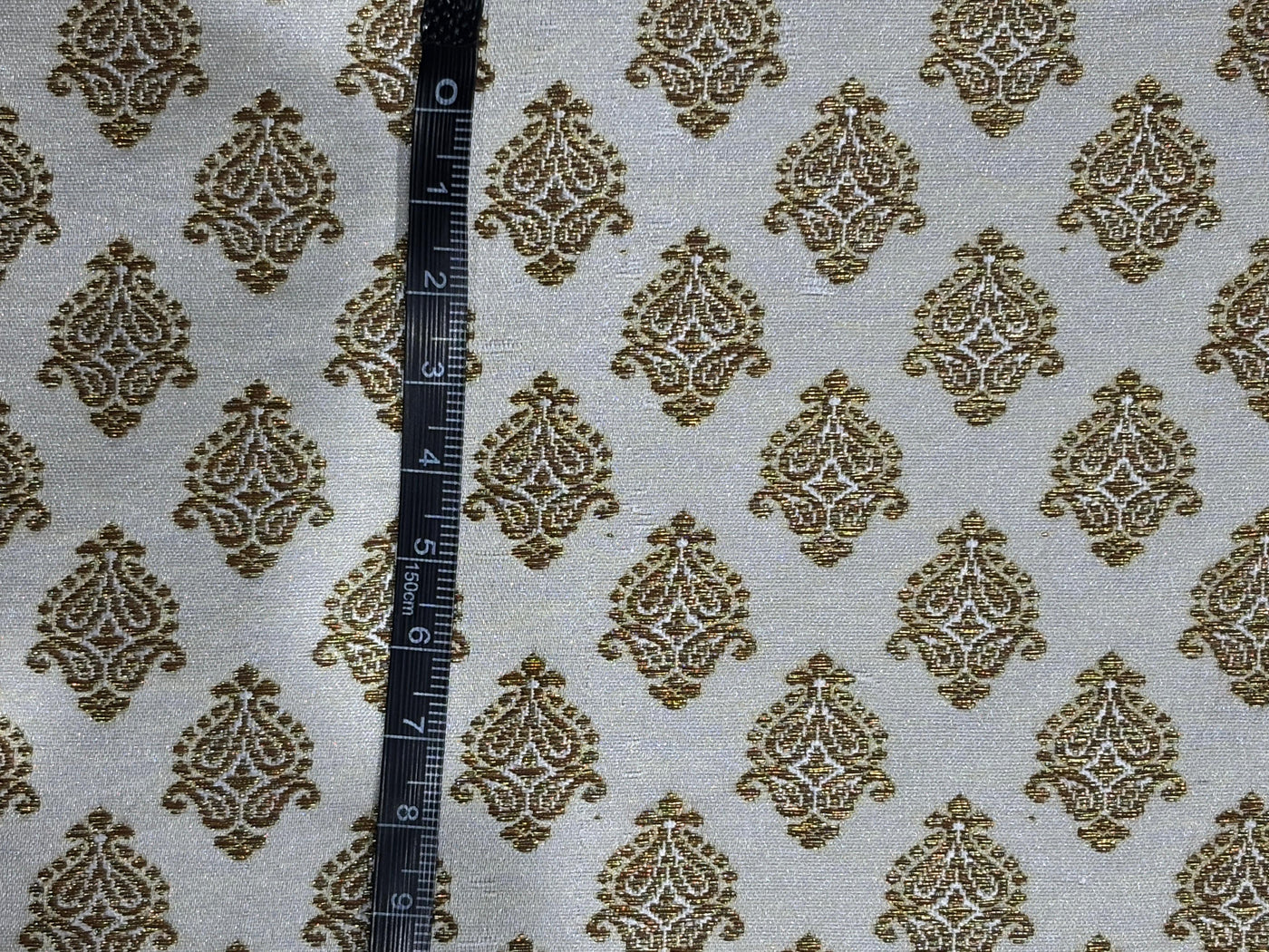 Silk Brocade fabric 44" dark ivory with antique gold jacquard motifs available in 2 designs leaf and paisley BRO1053