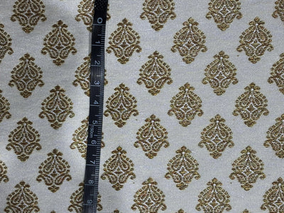 Silk Brocade fabric 44" dark ivory with antique gold jacquard motifs available in 2 designs leaf and paisley BRO1053