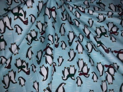 100% Cotton flannel Print 58"wide available in 3 prints penguin, snowmen and skiing on ice