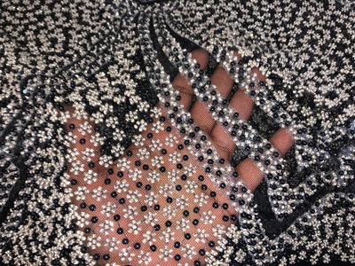 NET fabric with sequins and  pearls available in 2 colors black and white 56" wide [17807/08]