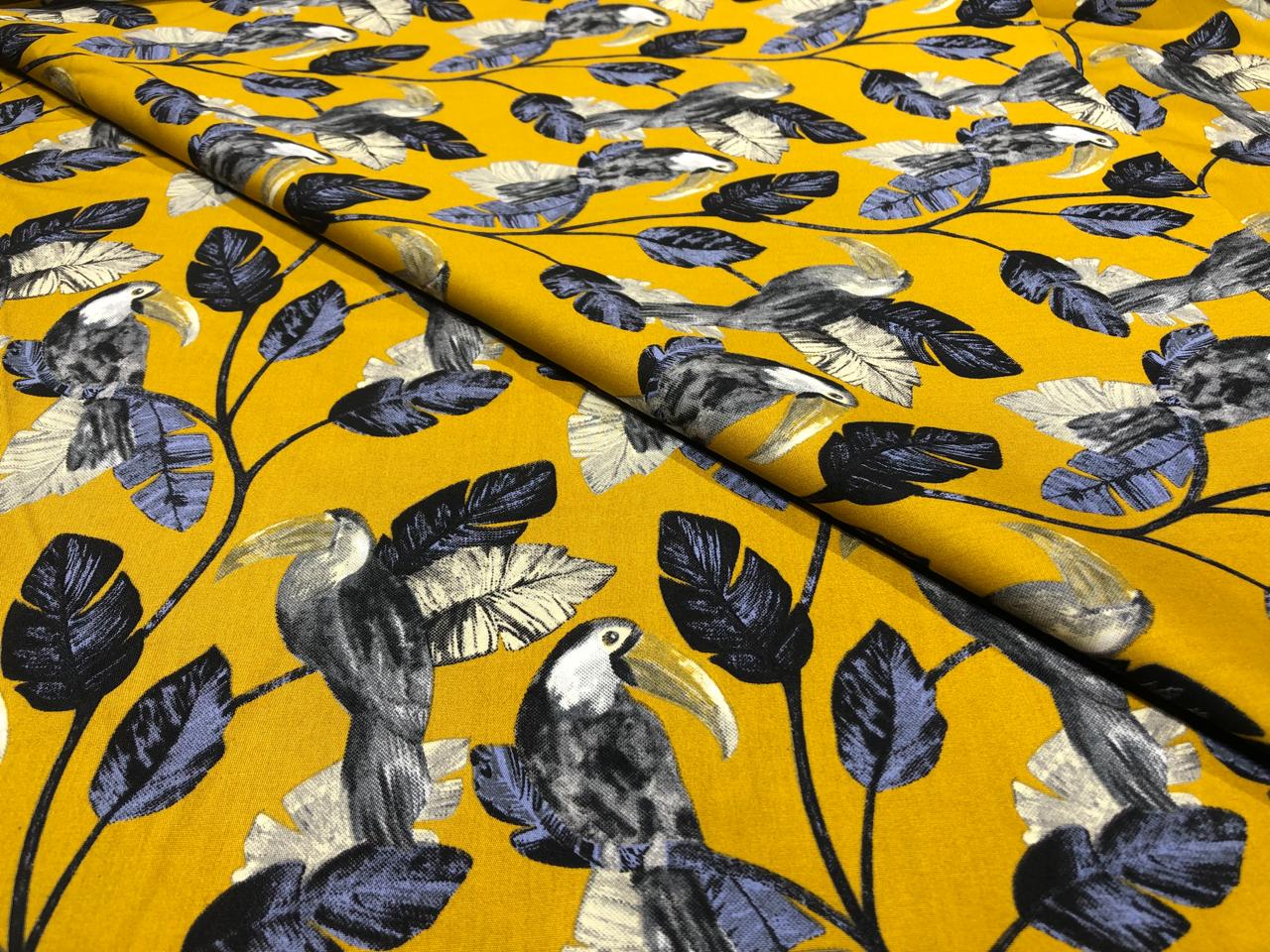 100% Cotton Poplin 58" wide digital print mustard with slate blue and grey leaves with parrots  [17613]
