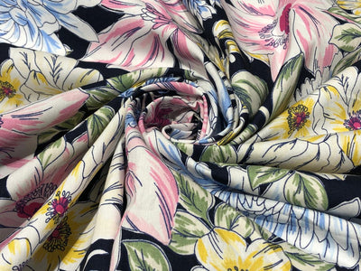 100% Cotton Poplin 58" black with pink, yellow ,blue and green floral [17581]