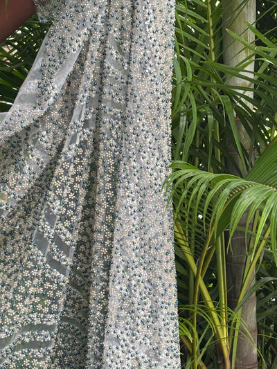 NET fabric with sequins and  pearls available in 2 colors black and white 56" wide [17807/08]