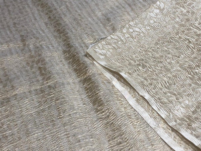 100% silk crepe rich ivory CRUSH jacquard with subtle gold effect 80 grams  44" wide available in 2 designs leaf and floral