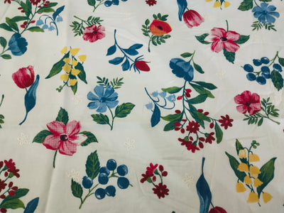 100% Cotton printed and  embroidered fabric  58 inches wide 147 cms. available in 2 colors purple orange floral and red blue floral