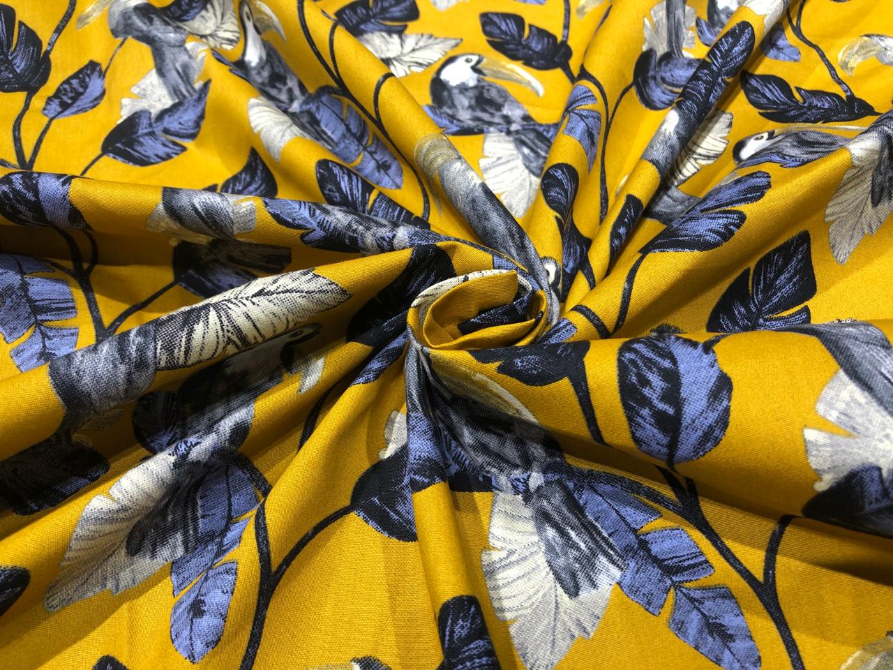 100% Cotton Poplin 58" wide digital print mustard with slate blue and grey leaves with parrots  [17613]