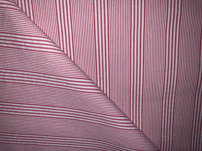 100% Cotton  Seer Sucker fabric available in 2 styles white abstract and red , white stripe