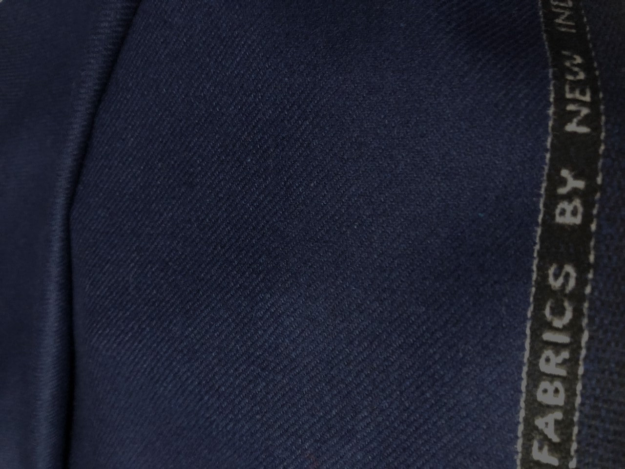 Wool x Nylon 270 gsm weight Suiting Fabric with twill weave available in 3 colors charcoal/black and ink blue