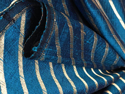 100% Silk Brocade in raw silk fabric available in 2 colors black and peacock blue with gold metallic stripe 44" wide BRO1070[3/4]