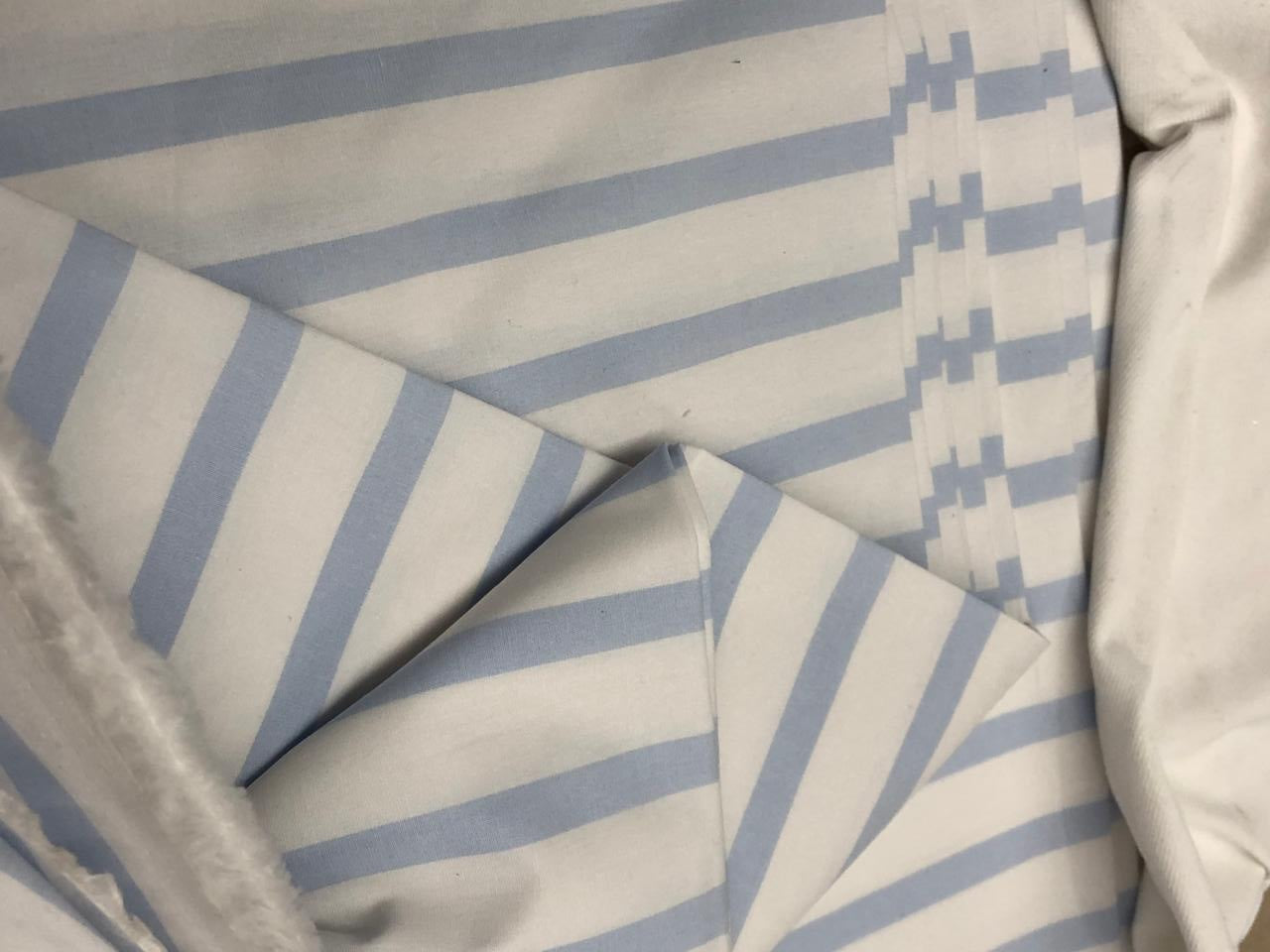 100% Cotton 58" wide available in 3 different blues pastel blue/white , navy/red/white , and blue/navy