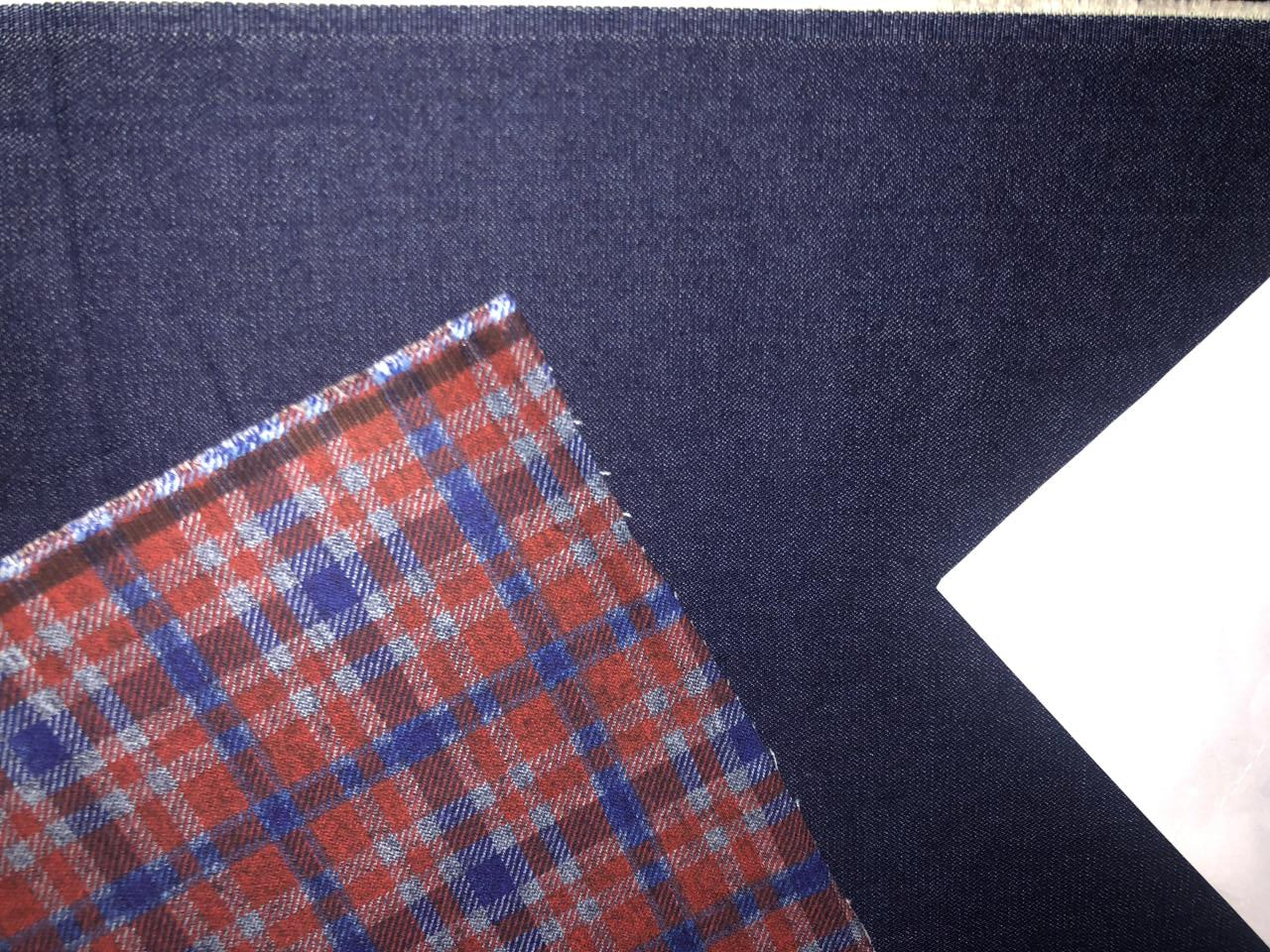 100% Cotton Denim Fabric 58" wide REVERSABLE available in 2 colors red and blue plaids with a solid denim blue reverse AND a blue purple plaid with a solid blue reverse with a