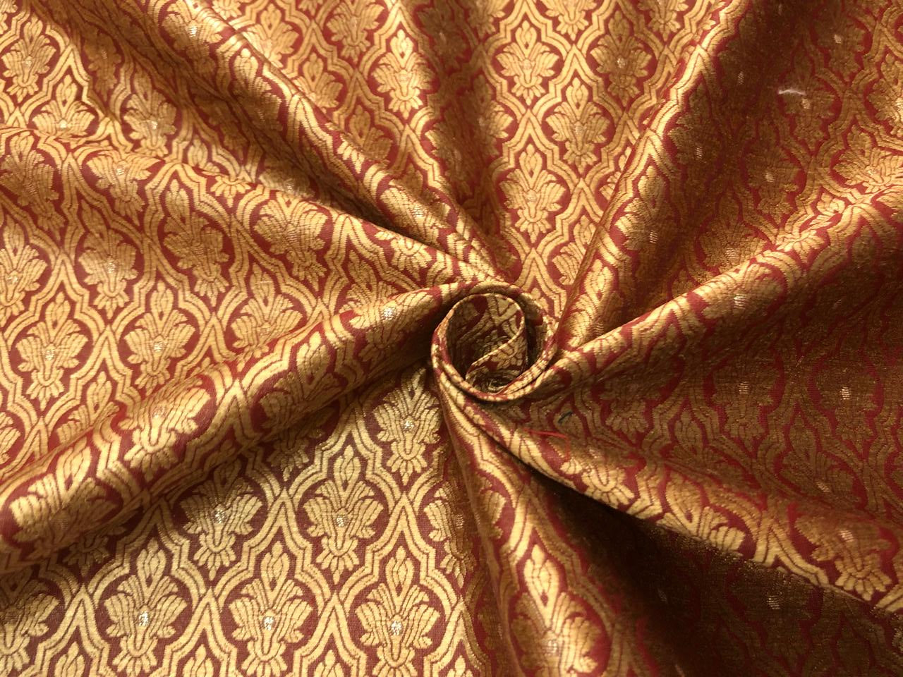 Silk Brocade fabric with subtle gold metallic jacquard motifs44" wide available in 4 colors rosy brown ,rust, bottle green and purple BRO1104