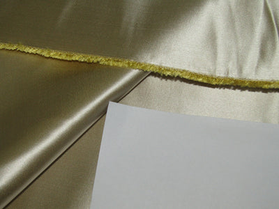 50% Silk 50% Cotton ,Cotton Silk 54" wide available in 5 colors khaki x black ,white gold ,sand gold, gold and mint