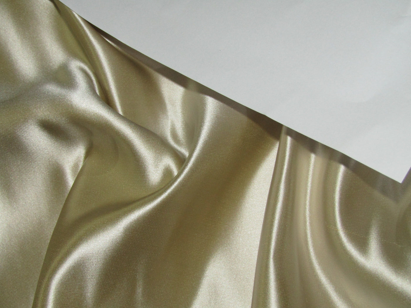 50% Silk 50% Cotton ,Cotton Silk 54" wide available in 5 colors khaki x black ,white gold ,sand gold, gold and mint