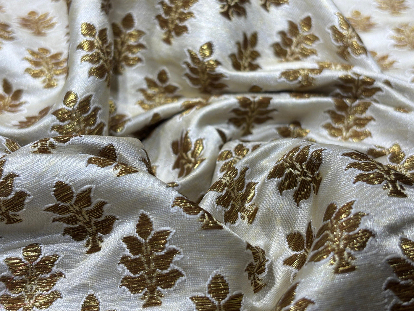Silk Brocade fabric 44" dark ivory with antique gold jacquard motifs available in 2 designs leaf and paisley BRO1053