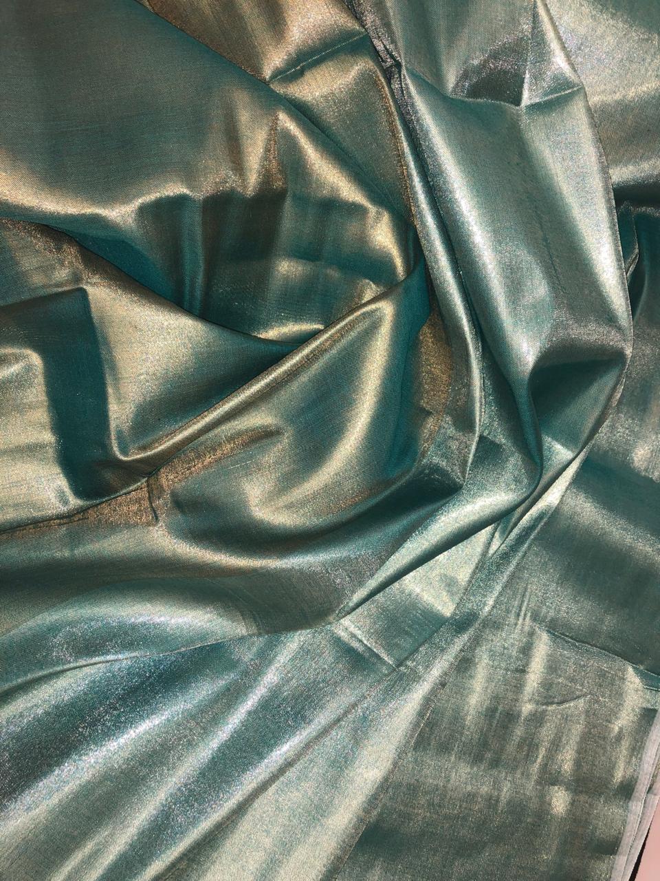 Cotton Tissue  sheer 44" wide 22" of each color half and half available in 2 colors blue/teal and gold/gold[ [18354/55]