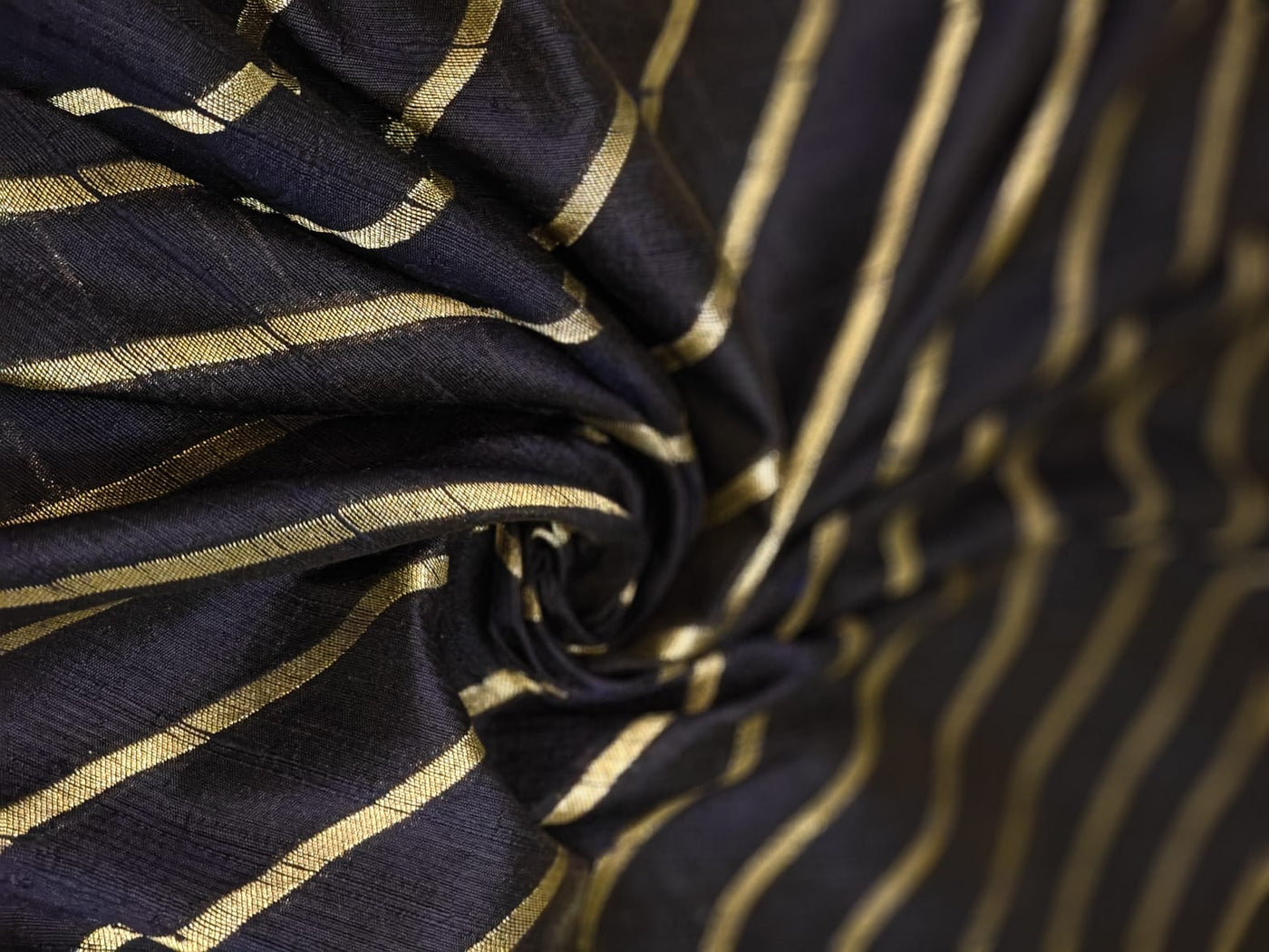 100% Silk Brocade in raw silk fabric available in 2 colors black and peacock blue with gold metallic stripe 44" wide BRO1070[3/4]