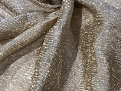 100% silk crepe rich ivory CRUSH jacquard with subtle gold effect 80 grams  44" wide available in 2 designs leaf and floral