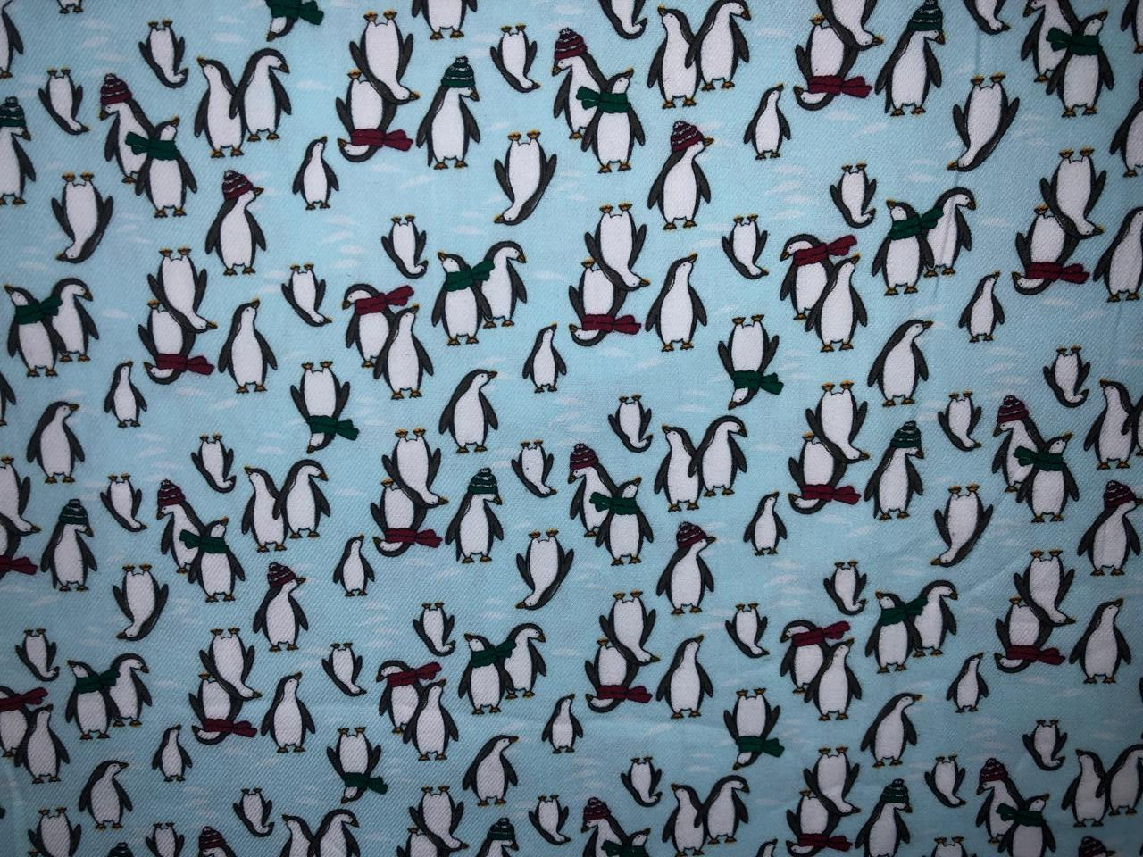 100% Cotton flannel Print 58"wide available in 3 prints penguin, snowmen and skiing on ice