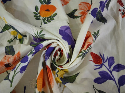100% Cotton printed and  embroidered fabric  58 inches wide 147 cms. available in 2 colors purple orange floral and red blue floral