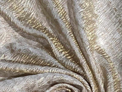 100% silk crepe rich ivory CRUSH jacquard with subtle gold effect 80 grams  44" wide available in 2 designs leaf and floral