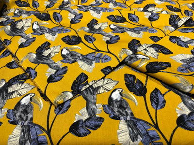 100% Cotton Poplin 58" wide digital print mustard with slate blue and grey leaves with parrots  [17613]