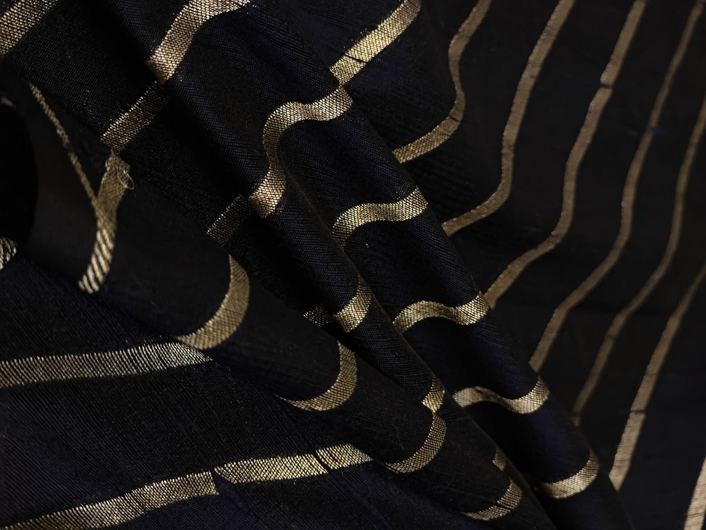 100% Silk Brocade in raw silk fabric available in 2 colors black and peacock blue with gold metallic stripe 44" wide BRO1070[3/4]