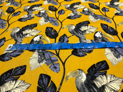 100% Cotton Poplin 58" wide digital print mustard with slate blue and grey leaves with parrots  [17613]