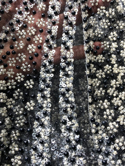 NET fabric with sequins and  pearls available in 2 colors black and white 56" wide [17807/08]