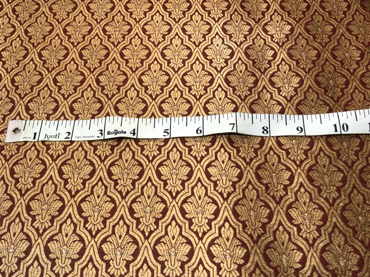 Silk Brocade fabric with subtle gold metallic jacquard motifs44" wide available in 4 colors rosy brown ,rust, bottle green and purple BRO1104