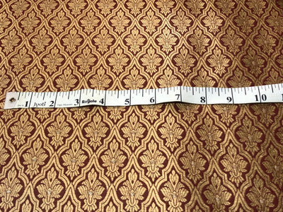 Silk Brocade fabric with subtle gold metallic jacquard motifs44" wide available in 4 colors rosy brown ,rust, bottle green and purple BRO1104