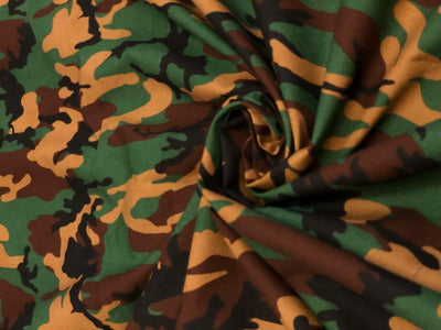 100% Cotton available in 2 prints and colors in the army  print 58" wide greens/ black and green/browns [18692/93]