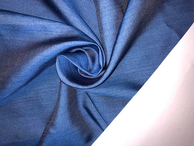 100% Tencel  Denim 5 ounce  Fabric  58" wide available in 7 colors blue/ dark denim blue/ charcoal grey / charcoal black/parrot green/bright yellow and sage