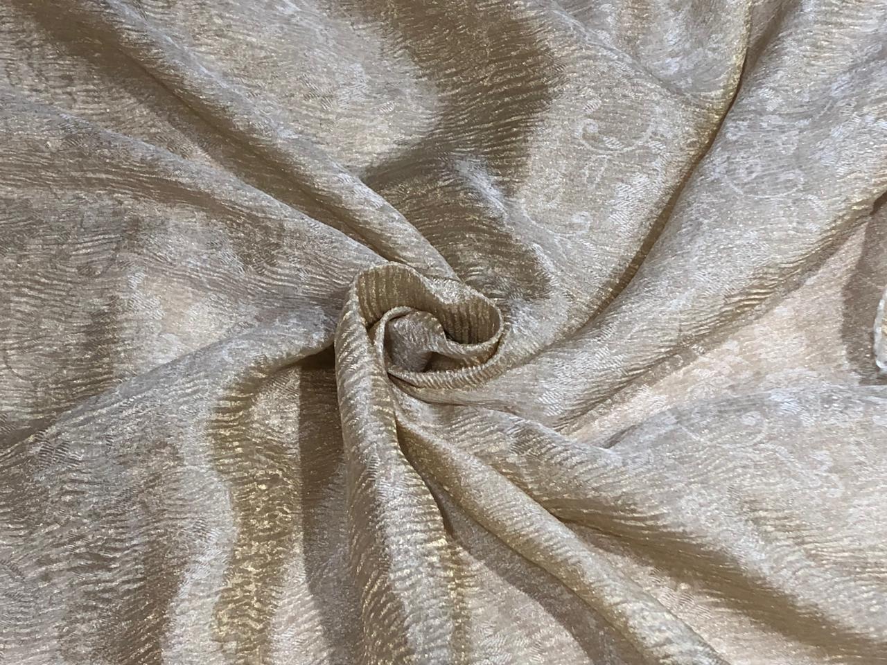 100% silk crepe rich ivory CRUSH jacquard with subtle gold effect 80 grams  44" wide available in 2 designs leaf and floral