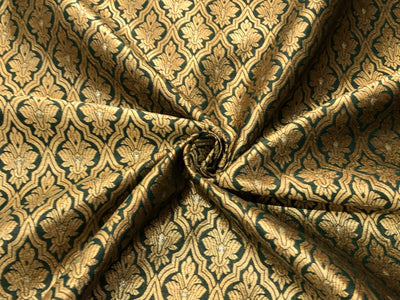 Silk Brocade fabric with subtle gold metallic jacquard motifs44" wide available in 4 colors rosy brown ,rust, bottle green and purple BRO1104
