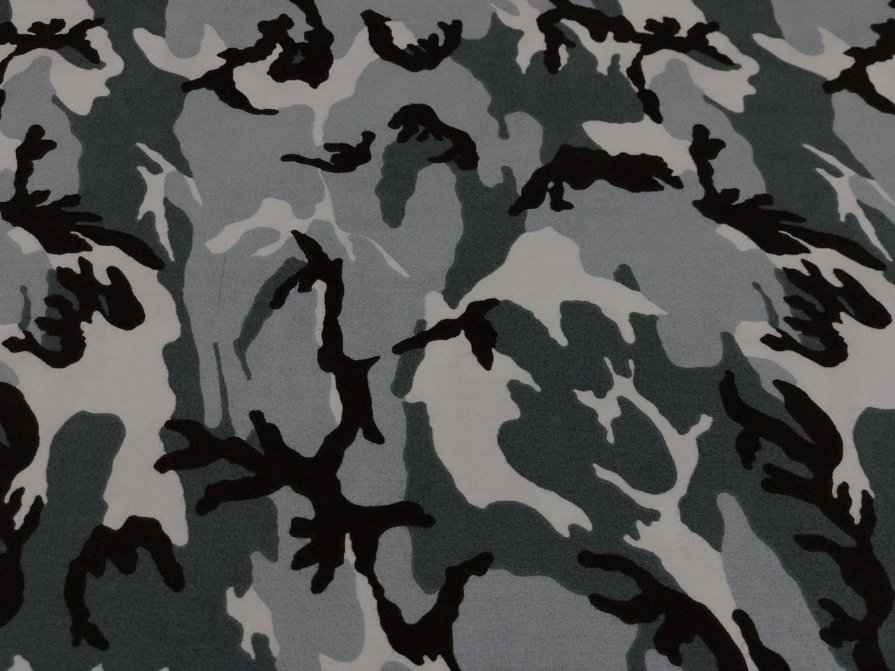 100% Cotton available in 2 prints and colors in the army  print 58" wide greens/ black and green/browns [18692/93]